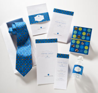 Circle of Care Leadership Conference cards necktie and bottle